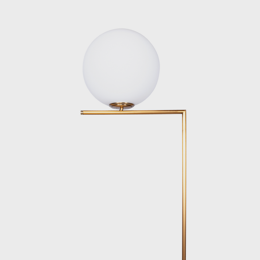 Modern gold floor lamp with spherical shade