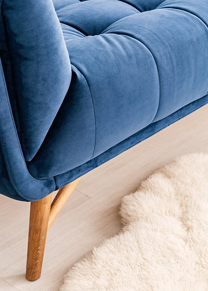 This image emphasizes interior design details, focusing on texture, comfort, and modern aesthetics.