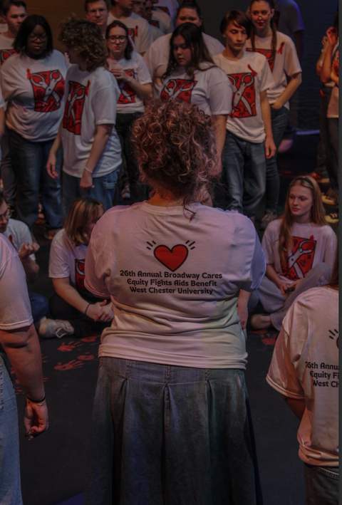 A shot of Laurel Bendetti leading outside performance groups and coordinating over 100 students during dress rehearsals for the 26th Annual BC/EFA Benefit and Silent Auction, demonstrating large-scale leadership, organization, and artistic direction.
