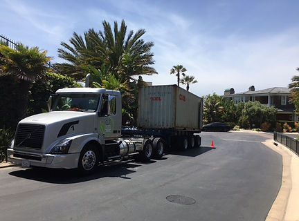 A transportation truck with a shipping container