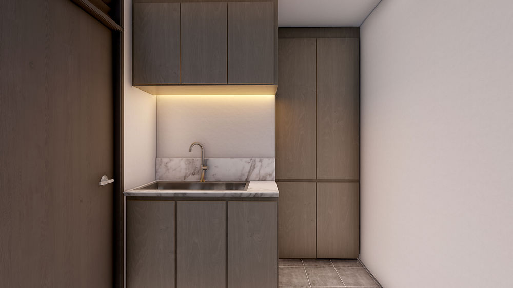 Modern kitchen with dark cabinets and sink in a penthouse condo.
