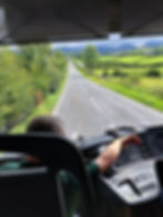 Renowned Irish tour guide Jonathan Beaumont describes the road ahead as we head to Downpatrick, with the Mourne Mountains looming in the distance.
