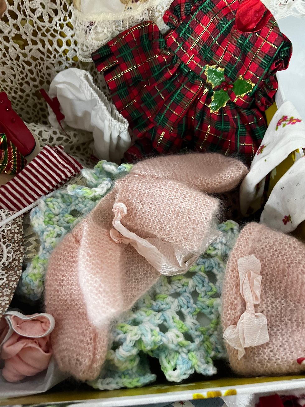 Thumbnail: Sharie with one of the layettes pictured