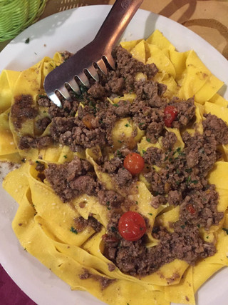 Tagliatelle with sausage ragù and cherry tomatoes