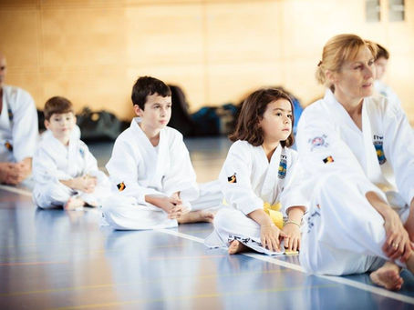 Taekwon-Do students, children and Adults learning together.