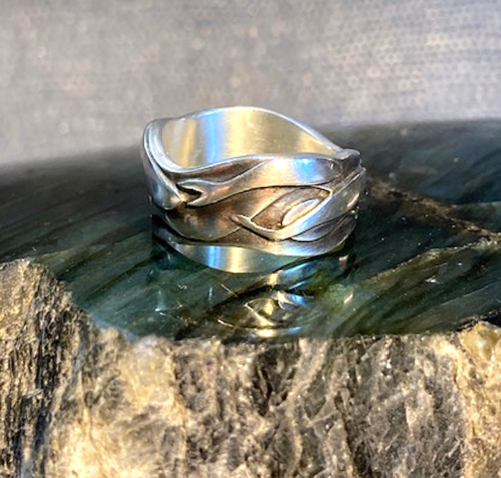 Silver fish ring.