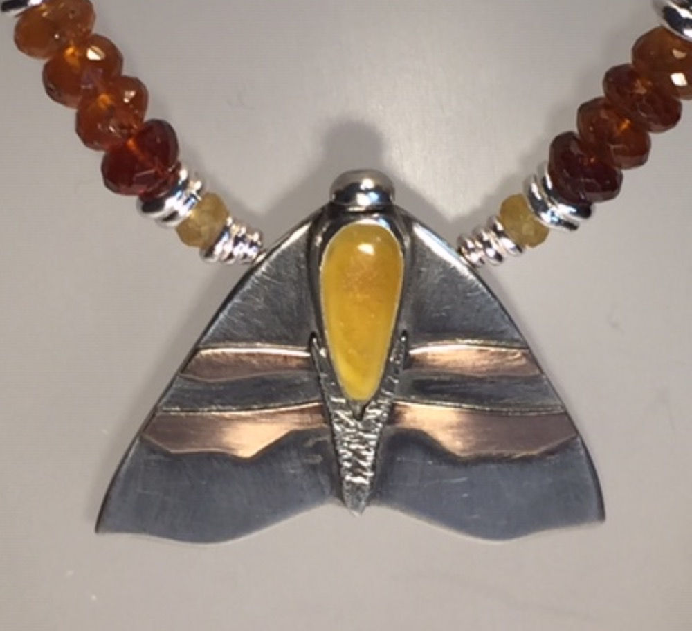 Amber moth necklace