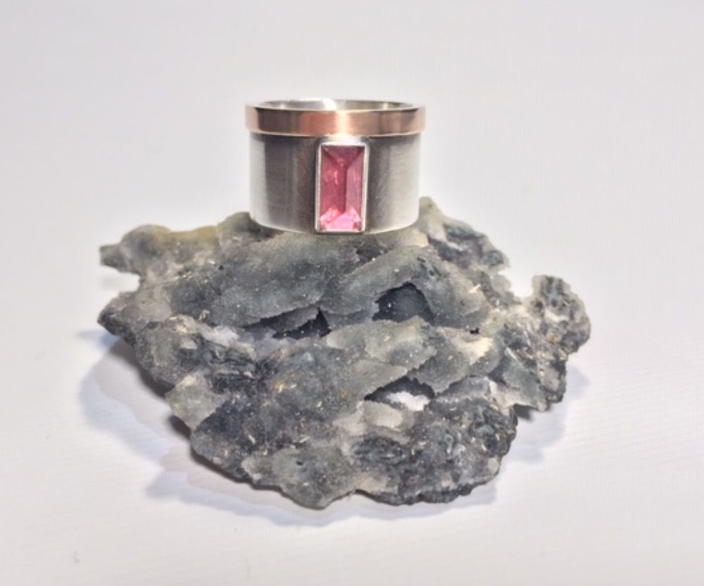 Facetted pink Tourmaline, silver and 18ct gold.