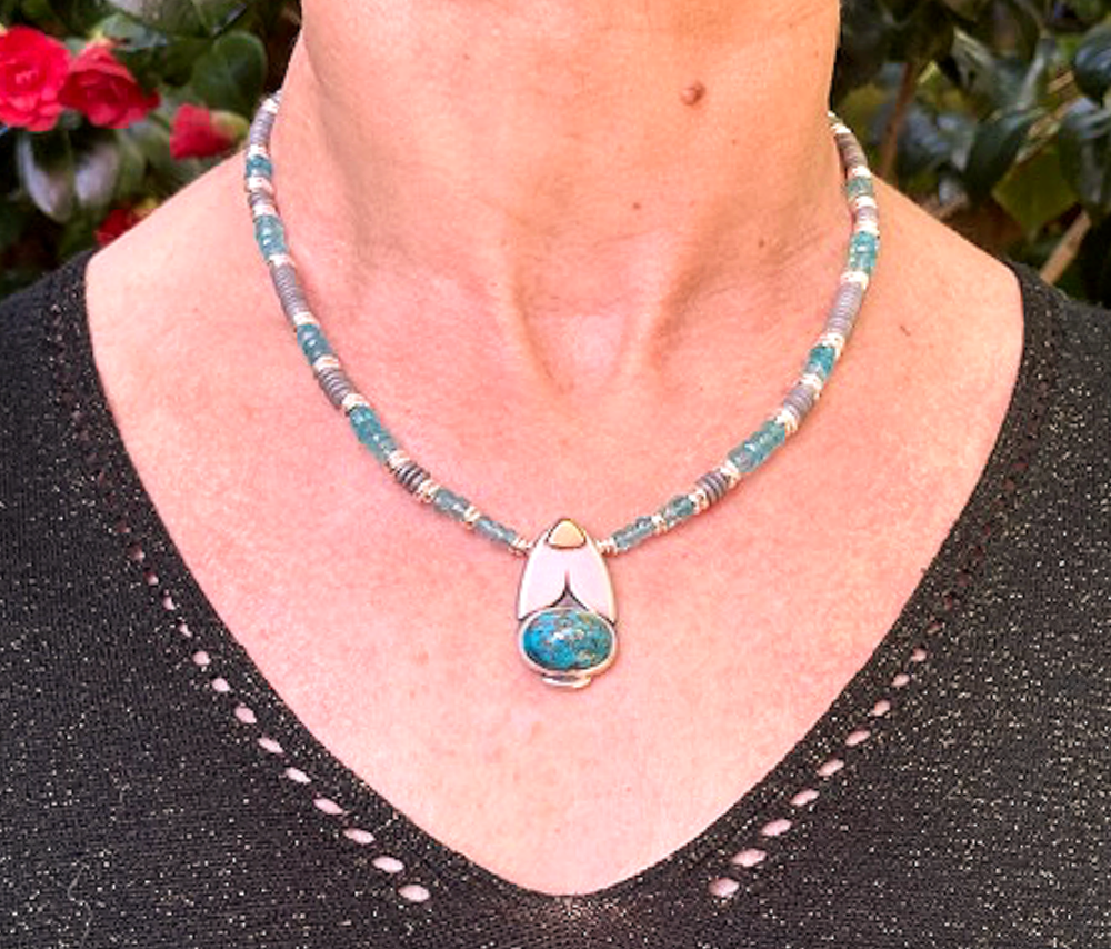 Turquoise beetle bud necklace.