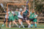 Girls playing youth lacrosse