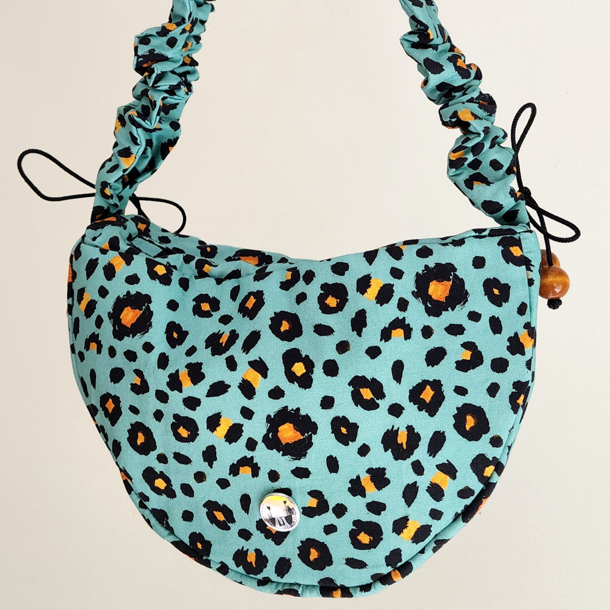 Bolsa Canoa – Onça Turquesa