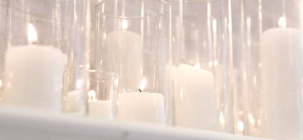 Candles on the fireplace mantle for a reception at aurora meadows