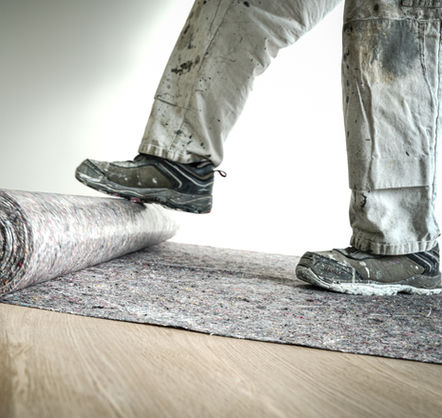 Afdekvlies uitrollen