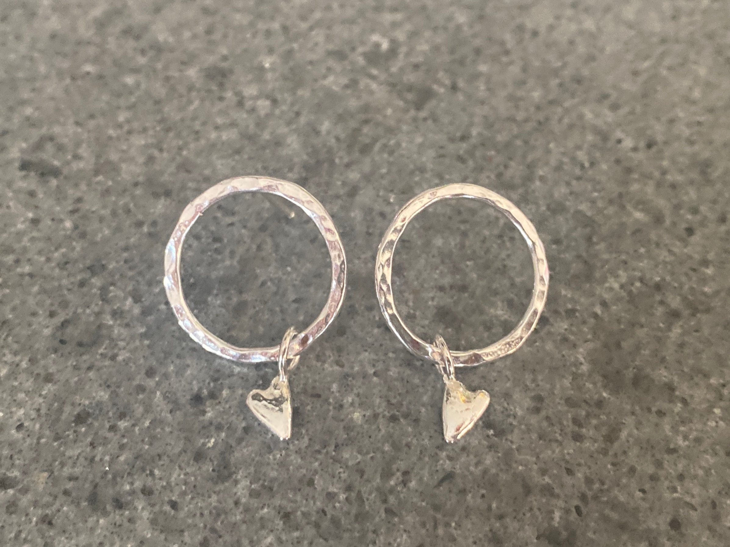 Circle studs with dangly tiny heart  
