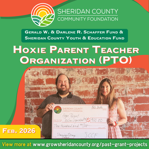 Pictured: SCCF Executive Director Karl Pratt and Hoxie PTO Member Michelle Cressler.