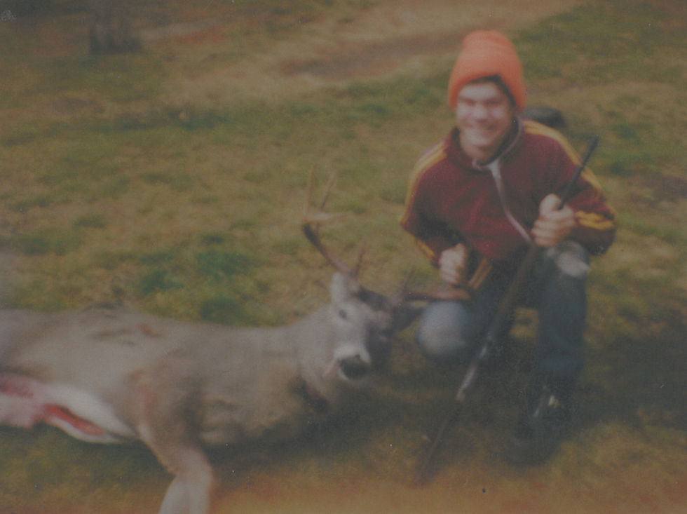 Buddy hunting deer, 1981