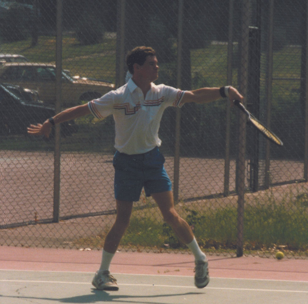 Buddy working as a tennis and croquet manager at Maddens Resort on Gull Lake, 1985