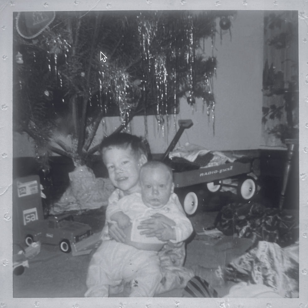 Buddy (left), with his brother Billy (right) on Christmas, 1967