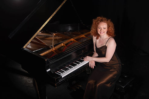 Francesca Hurst at piano.jpeg