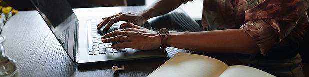 header-with-businesswoman-working-laptop.jpg