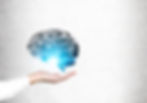 an out stretched hand with an illustration of a brain 