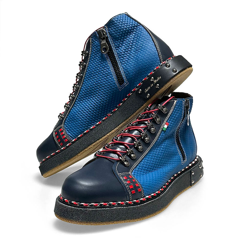 Close-up of beige high-top sneakers with tailored trousers and blazer