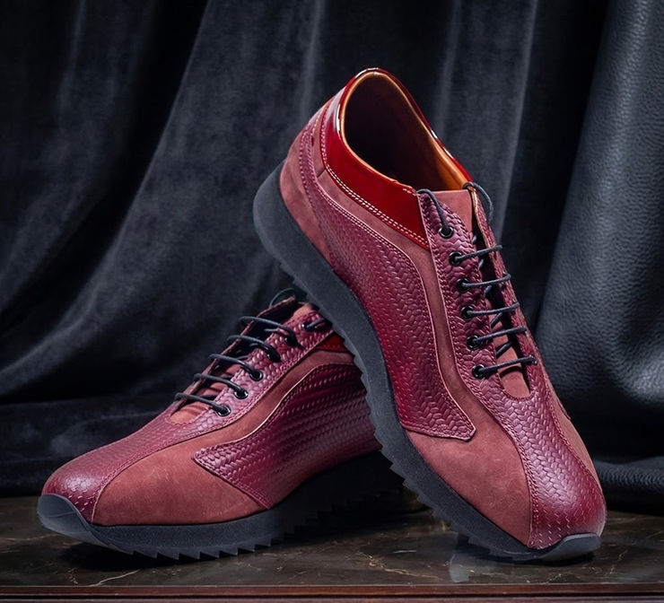 A handcrafted basketball high top sneaker made from authentic sports material in Italy