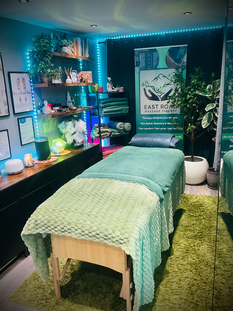 High angle view of a peaceful massage therapy room with soft cushions and natural light