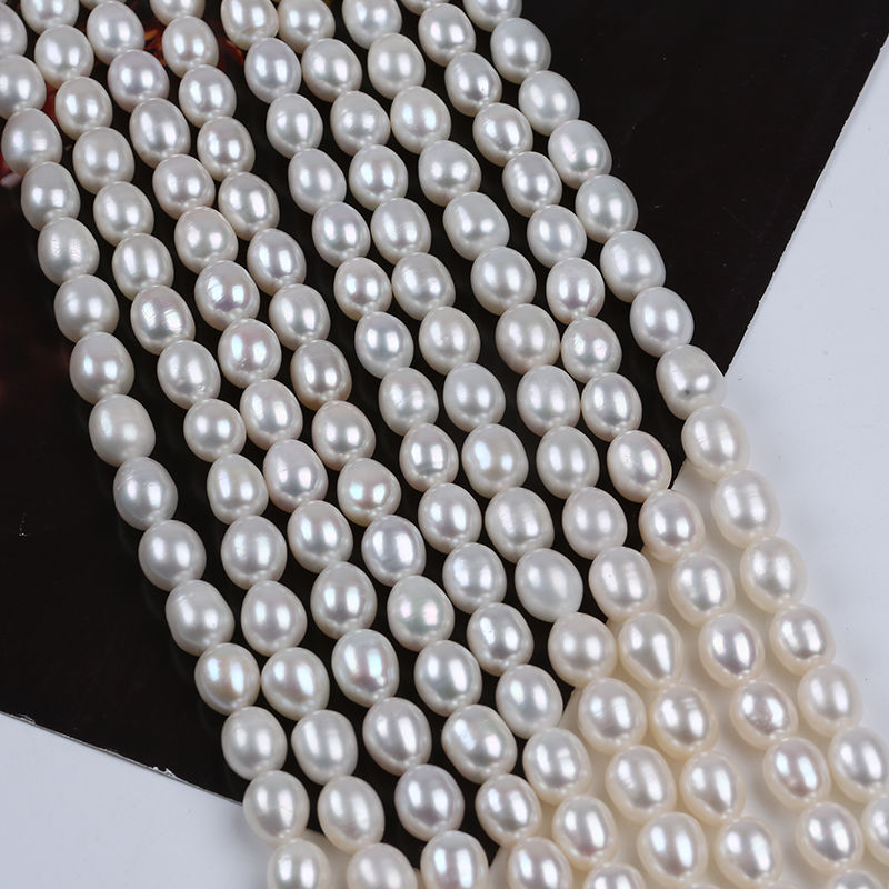 Thumbnail: 7-8mm Natural White Rice Freshwater Pearl Strands