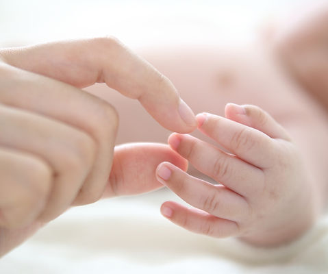 Mor Holding Baby Finger
