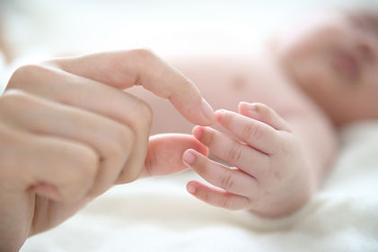 Mother Holding Baby Finger