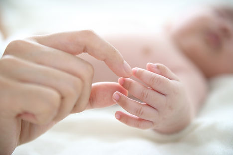 Mother Holding Baby Finger