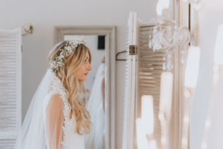 bride with loose waves and flower crown