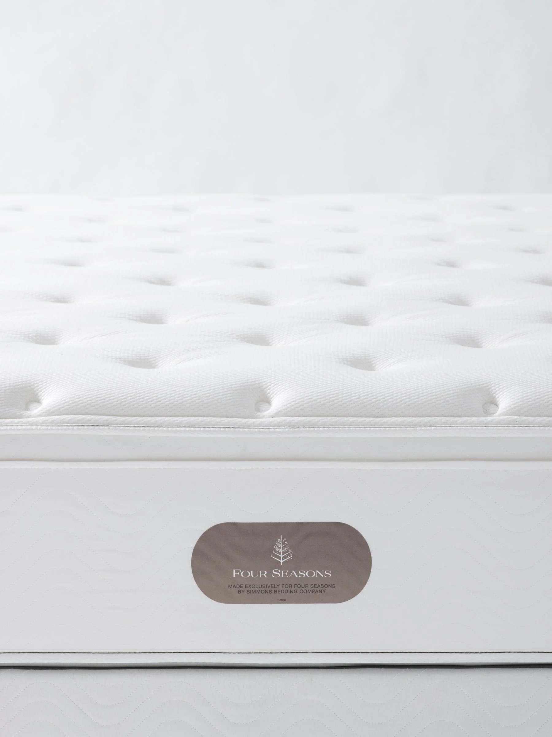 Four Seasons Signature Plush Mattress featuring premium craftsmanship and exceptional comfort for a luxury hotel bedroom.