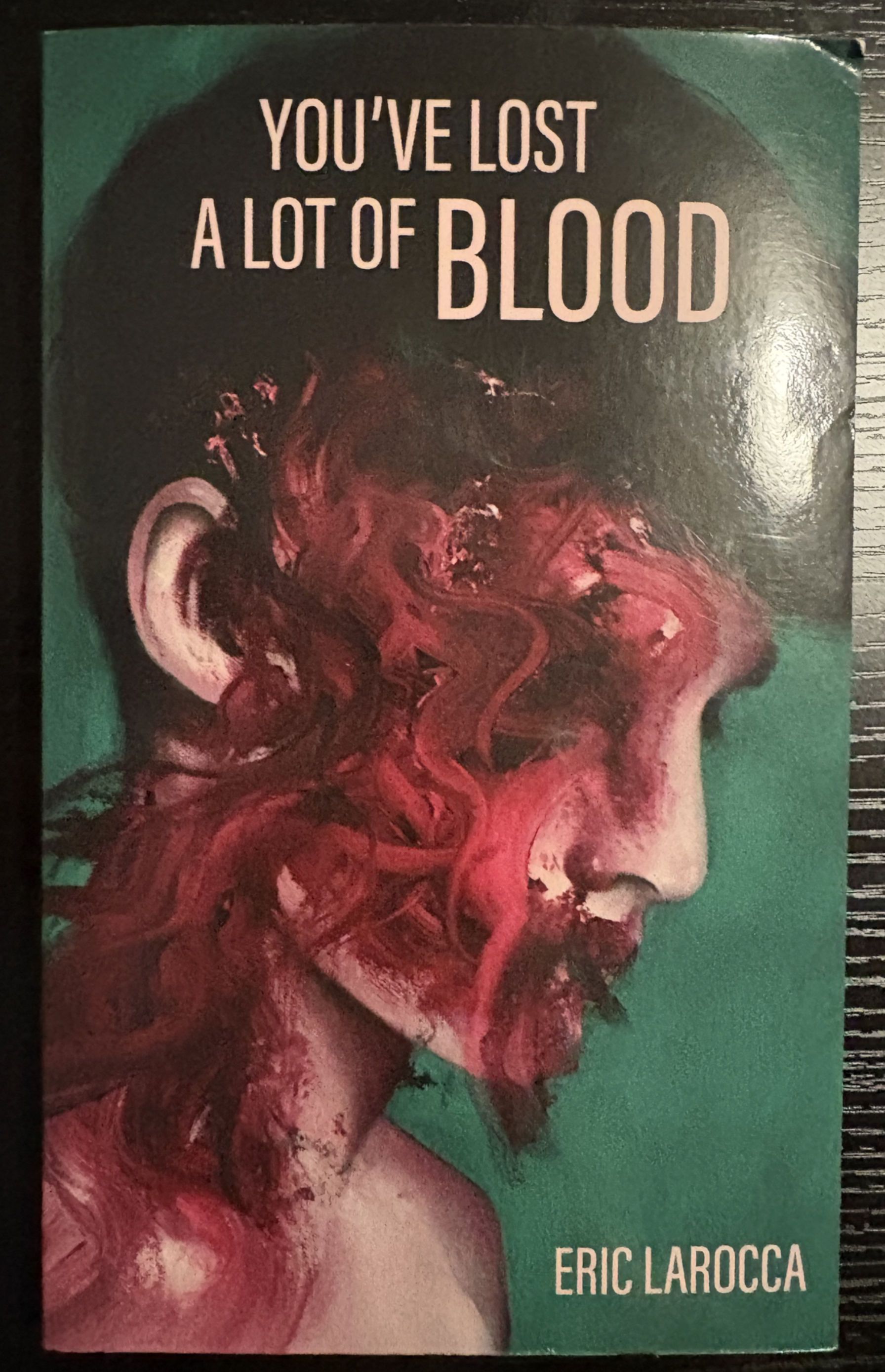 You've Lost A LOT OF BLOOD book cover featuring a bloody face against green.