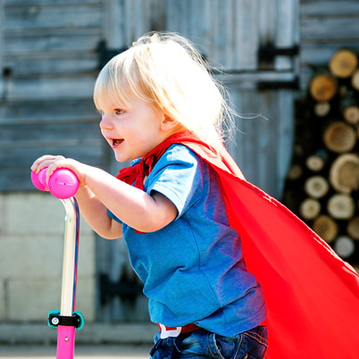 superhero-baby-boy-using-scooter-adorabl