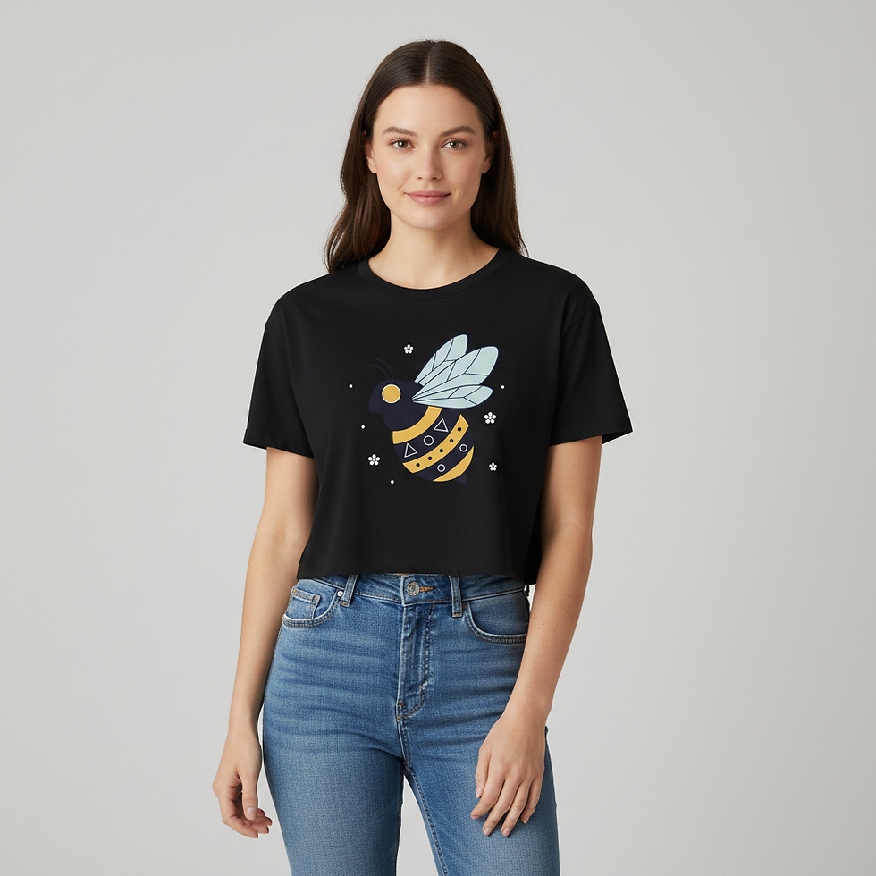 Woman wearing black Graphic Bee crop top with playful bee illustration