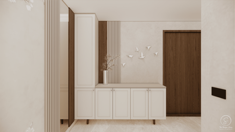 Contemporary entrance foyer with a custom console cabinet, decorative wall accents, wooden door, ambient lighting, and refined modern home interiors