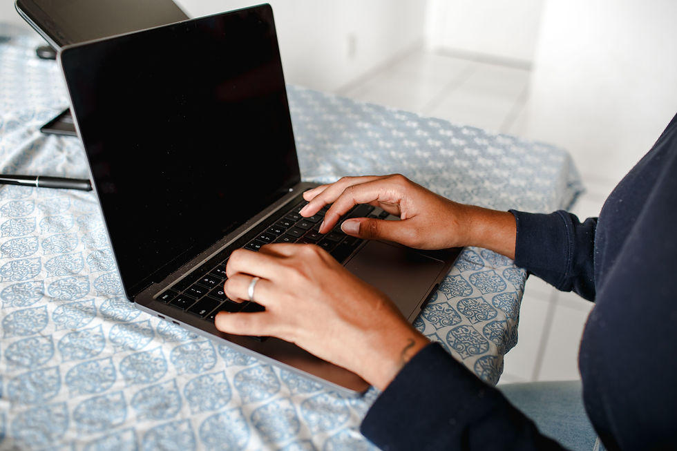 Close-up of someone working on a laptop, representing achievement-driven survival patterns explored with a South Asian therapist for complex trauma in NYC | south asian therapist for complex trauma nyc - south asian therapy for complex trauma nyc - immigrant trauma therapy nyc