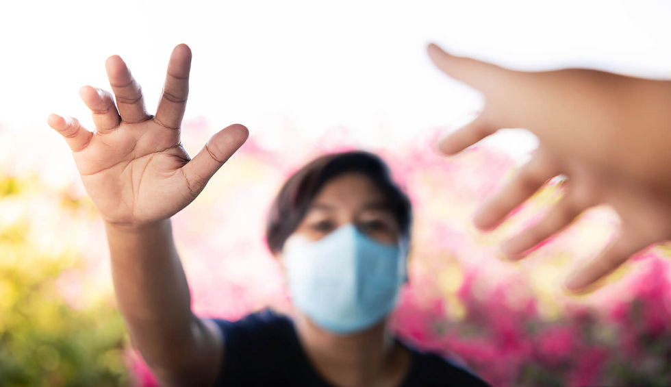 Image of an adolescent in a mask reaching out for help | teen counseling in Atlanta, GA | teenage therapy in Smyrna, GA | teen therapy in Alpharetta | 30081 | 30082 | 30080