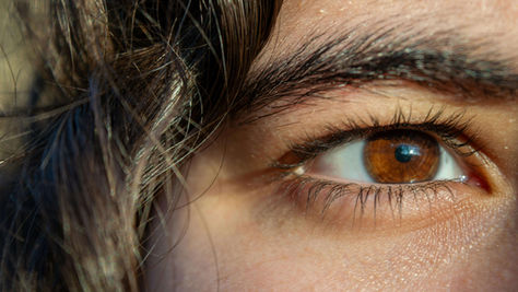 Close-up of a brown eye, symbolizing insight and processing supported by an EMDR therapist in New York | emdr therapist new york - emdr therapy new york, ny - emdr therapy nyc