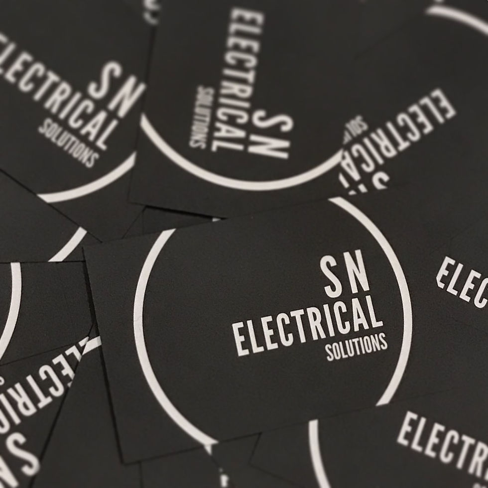 Stack of SN Electrical Solutions business cards