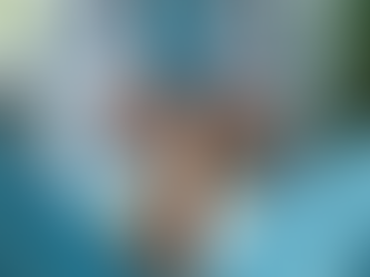 Podiatrist examiming a patient's feet in a clinical setting during a foot health consultation