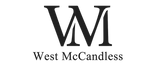 WoodWick Candles logo in black on a dark background, with WM letters.