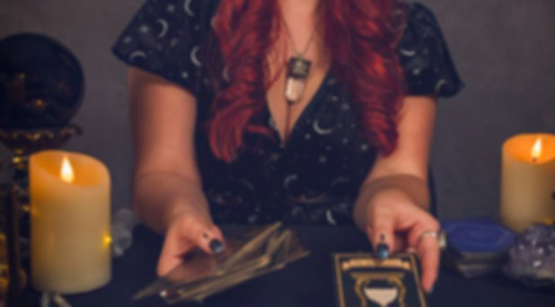 Amy the Kitchen Witch offering intuitive insights at a themed party