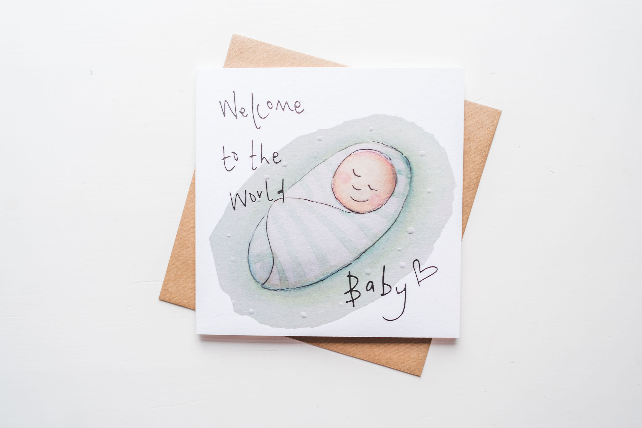 New Baby - baby in a green swaddle