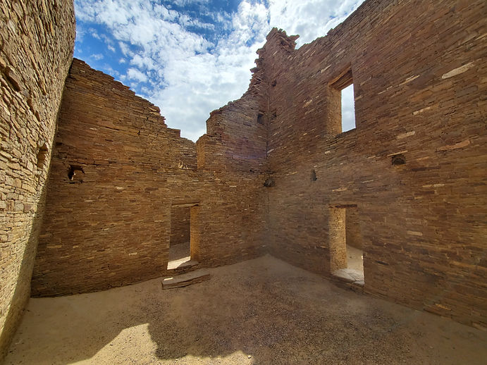 Ancient stone masonry ruins with door and window openings