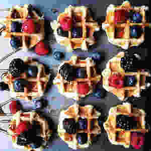 bourbon syrup drizzled Belgian waffles, organic farm fresh berries