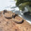 Thumbnail: close up of sterling silver patterned hoop stud earrings