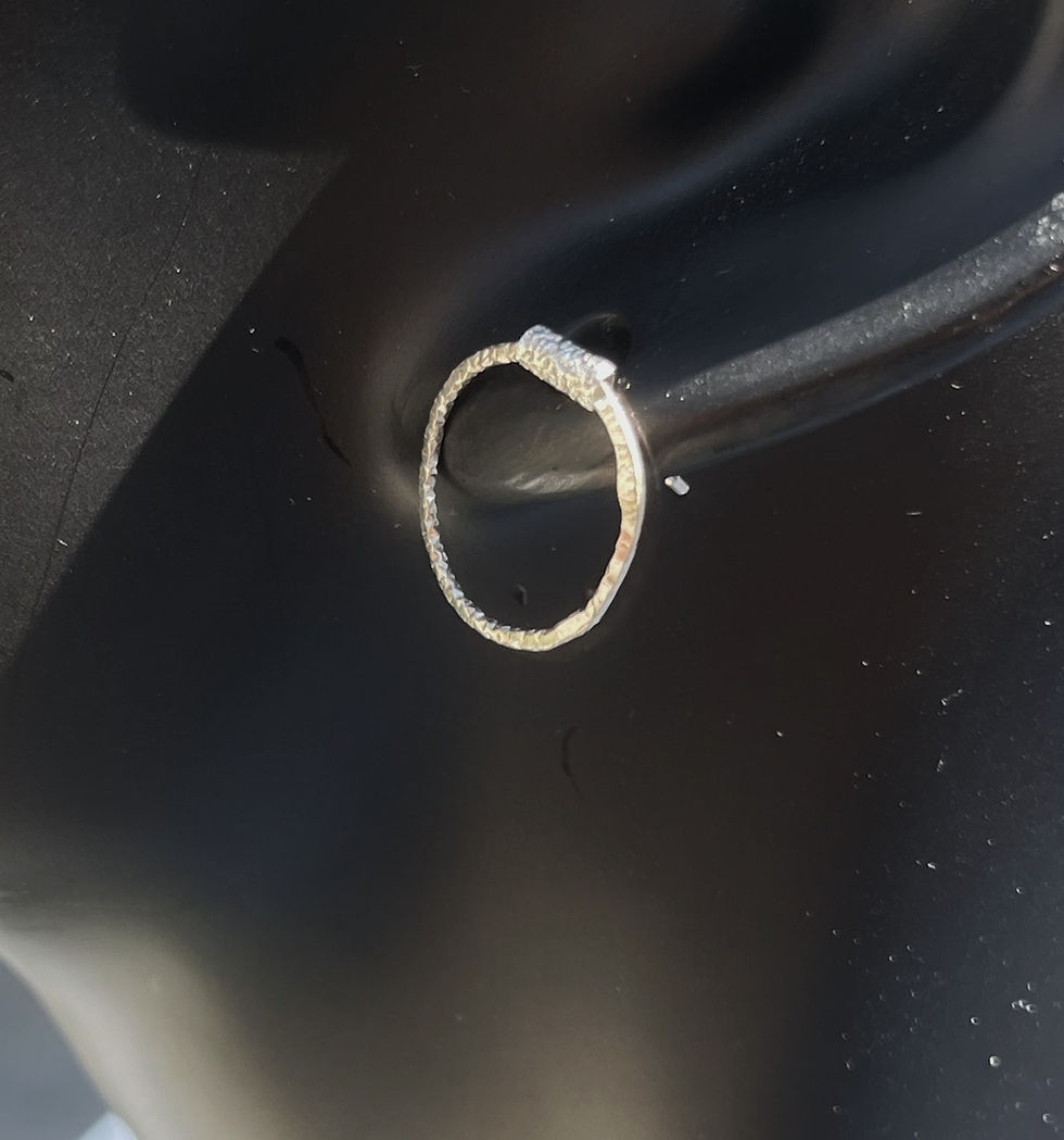 Thumbnail: close up view of sterling silver, delicate hoop and bar studs earrings